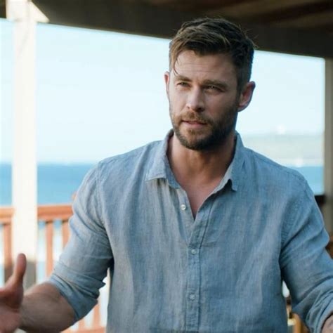 chris hemsworth blue shirt.